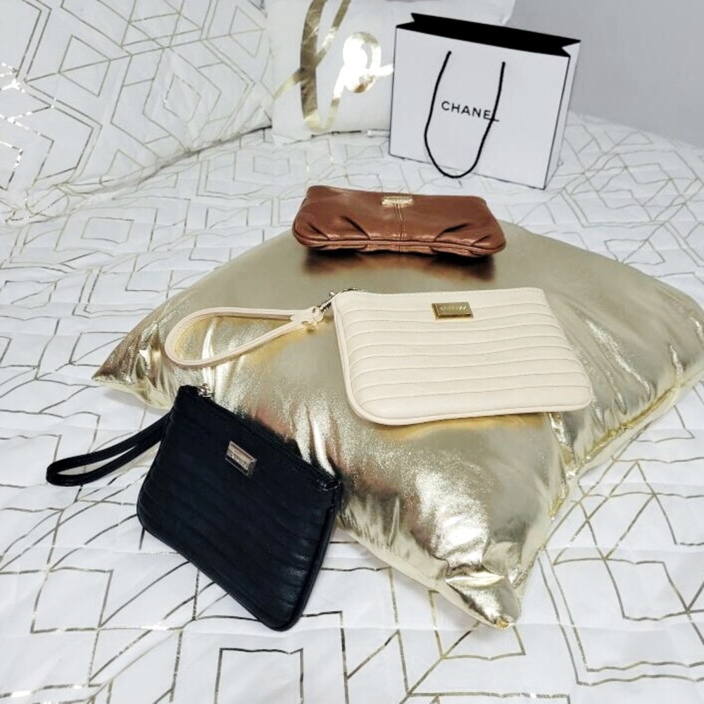 Express Black, Tan and Beige Wristlet. $10 each